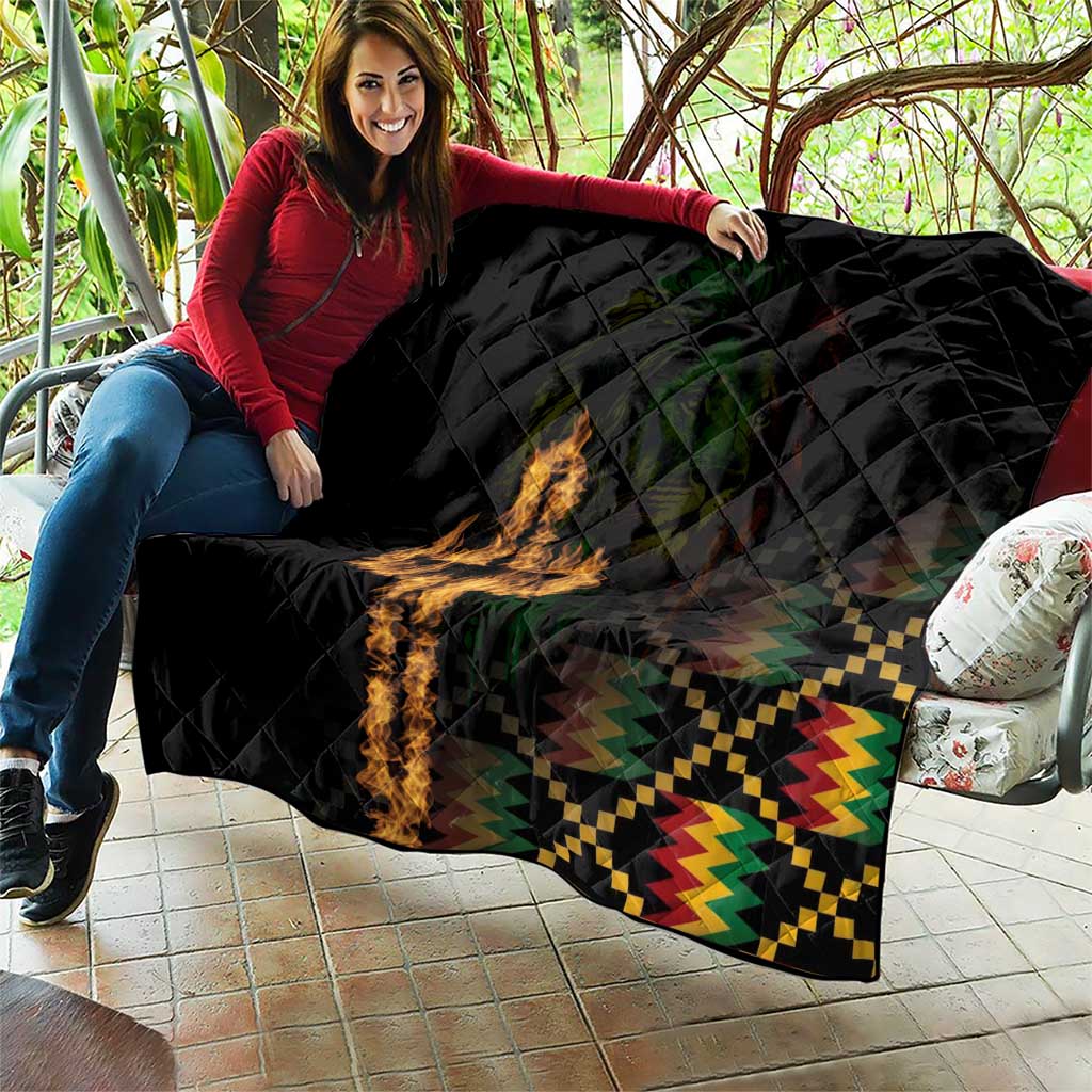 Black quilt blanket with diamond stitching, flaming cross and colorful zigzag edge