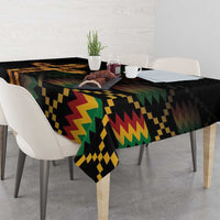Black tablecloth draped on dining table with zigzag multicolor emblem