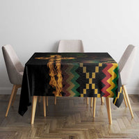 Black tablecloth on dining table with flame and geometric multicolor motif