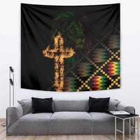 Black hanging tapestry with flaming cross, lion face, and multicolor zigzag and checkered graphics