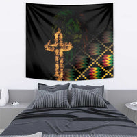 Black decorative tapestry with flaming cross design, lion face, and multicolor zigzag shapes