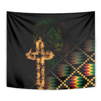 Black tapestry with flaming cross, lion face, and multicolor zigzag and check pattern