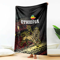Meskel Ethiopia blanket hanging like a banner, black with lion of Judah and ETHIOPIA