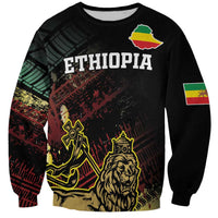 Unisex black sweatshirt with Ethiopia text, Lion of Judah graphic, multicolor grunge stripes