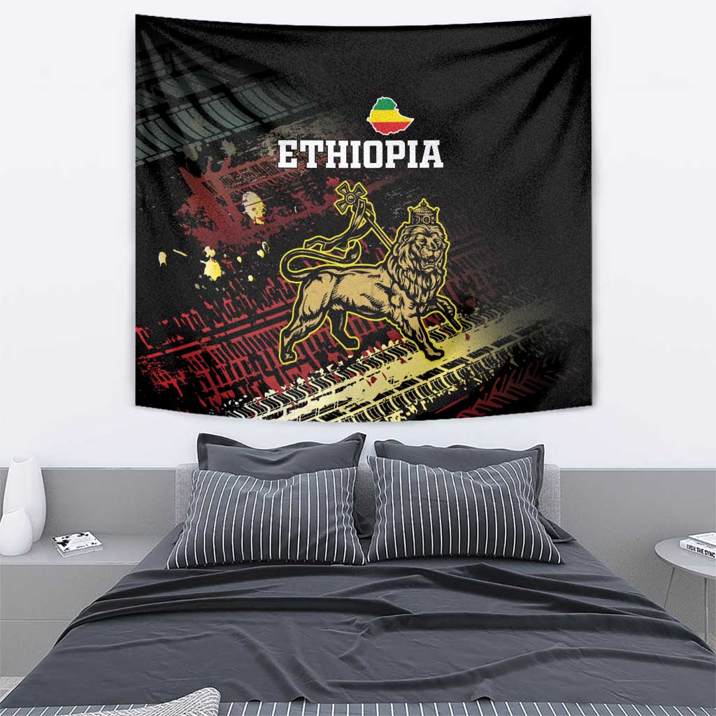 Black Ethiopia tapestry with gold lion figure and grunge stripe accents, hanging above bed