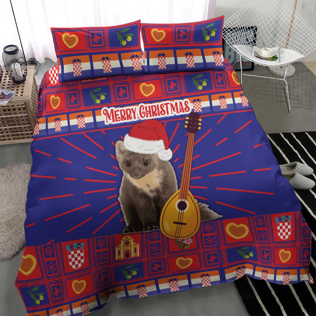 Christmas bedding set with blue and red duvet and two pillowcases, “Merry Christmas” banner and cat with guitar