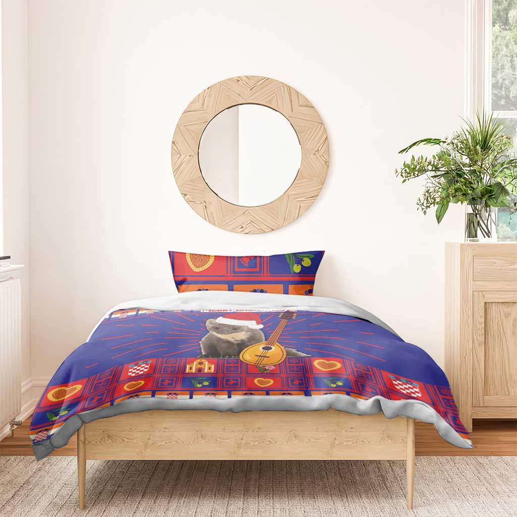 Christmas bedding set on a wooden bed: blue red duvet with cat graphic and guitar, one pillow