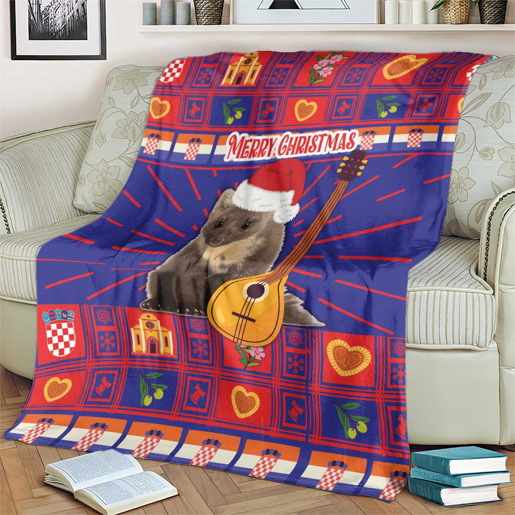 Red and blue plaid Christmas blanket on sofa with koala in Santa hat holding guitar, Merry Christmas