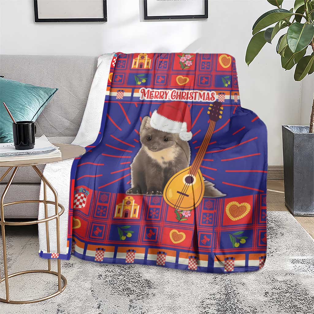 Blue and red plaid Christmas blanket with koala in Santa hat holding guitar