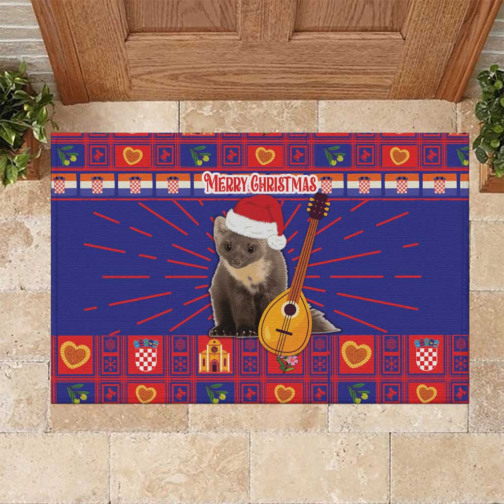 Blue Christmas rubber doormat with cat in Santa hat holding a guitar and "Merry Christmas"