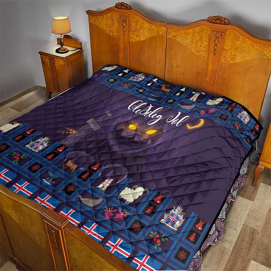 Purple quilt blanket on bed with blue Christmas cat border and moon glow