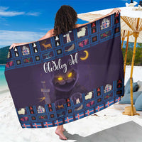 Purple holiday cat sarong with blue grid houses, moon, and lettering graphic