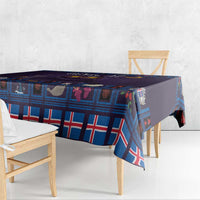 Rectangular Christmas tablecloth with blue plaid and red white accents on edges