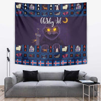 Purple Christmas tapestry with glowing cat face and festive icons border, wall hanging.