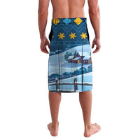 Blue Christmas lavalava sarong with village scene, stripes, and gold snowflake ornaments
