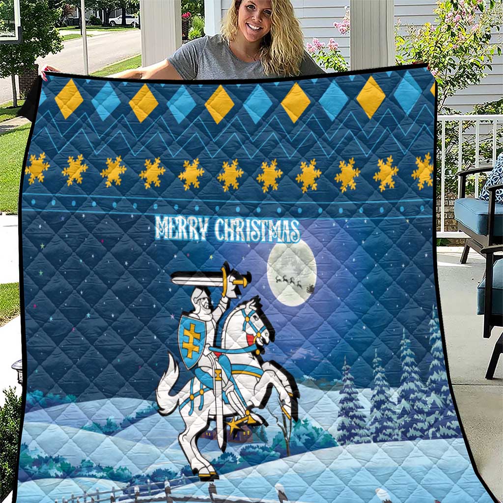 Blue quilt blanket with gold diamond pattern, “Merry Christmas,” and knight graphic