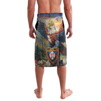 Men's printed swim shorts featuring a central eagle with shield crest on blue