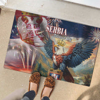 Blue rubber doormat with eagle graphic, fireworks, and shield emblem