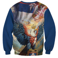 Unisex blue sweatshirt with large eagle graphic, fireworks, and coat of arms.