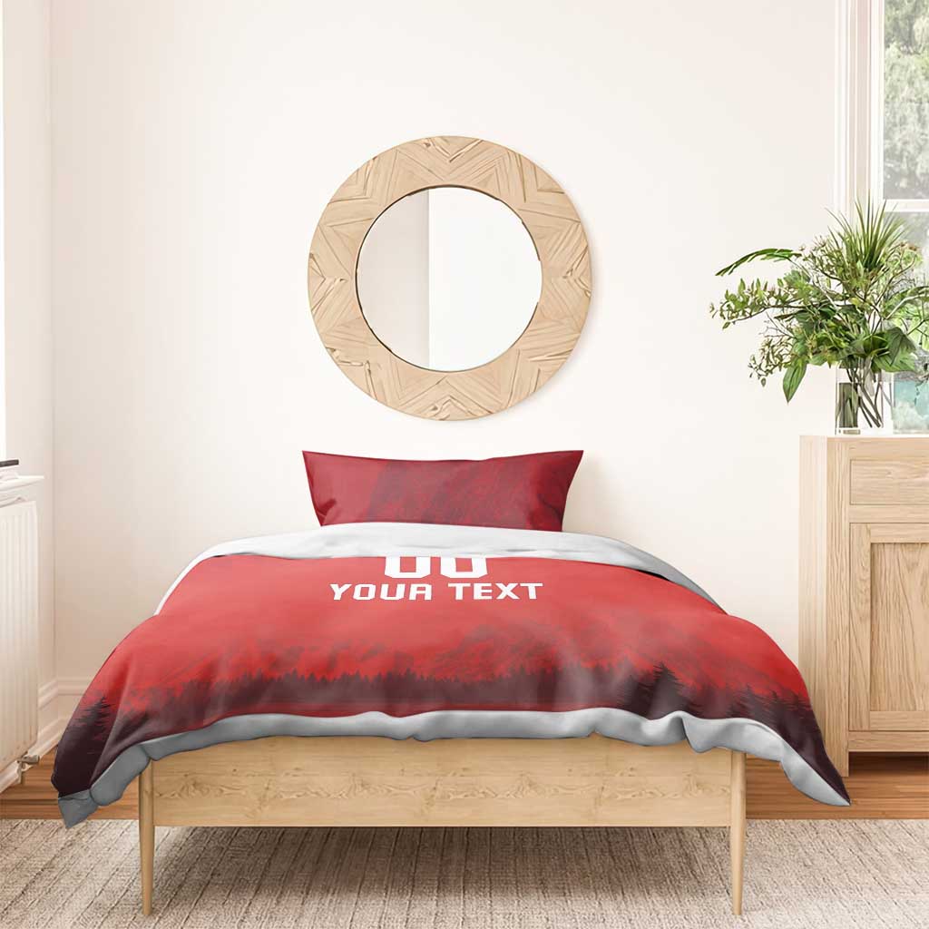 Red duvet set with 'DO YOUR TEXT' print and forest-mountain scene; two pillow shams