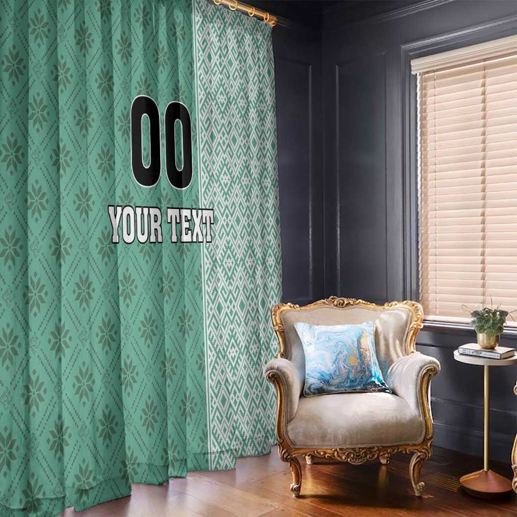 Green patterned window curtains with custom text print and hanging rod at top.