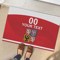 Red rubber doormat with “00 YOUR TEXT” and Czech crest inside white-bordered band