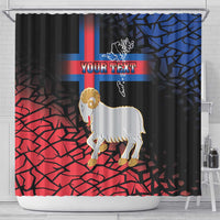 Black shower curtain featuring coat of arms sheep emblem with red-blue geometric flag pattern