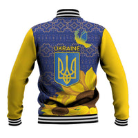 Unisex baseball jacket back view, blue folk print with Ukraine emblem, dove and sunflowers