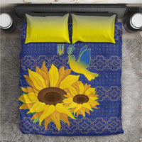Blue duvet cover with yellow sunflower print, folk pattern, and two lime-yellow pillowcases