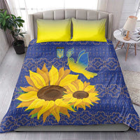 Blue sunflower bedding set with two lime-yellow pillows, folk motifs, and dove graphic