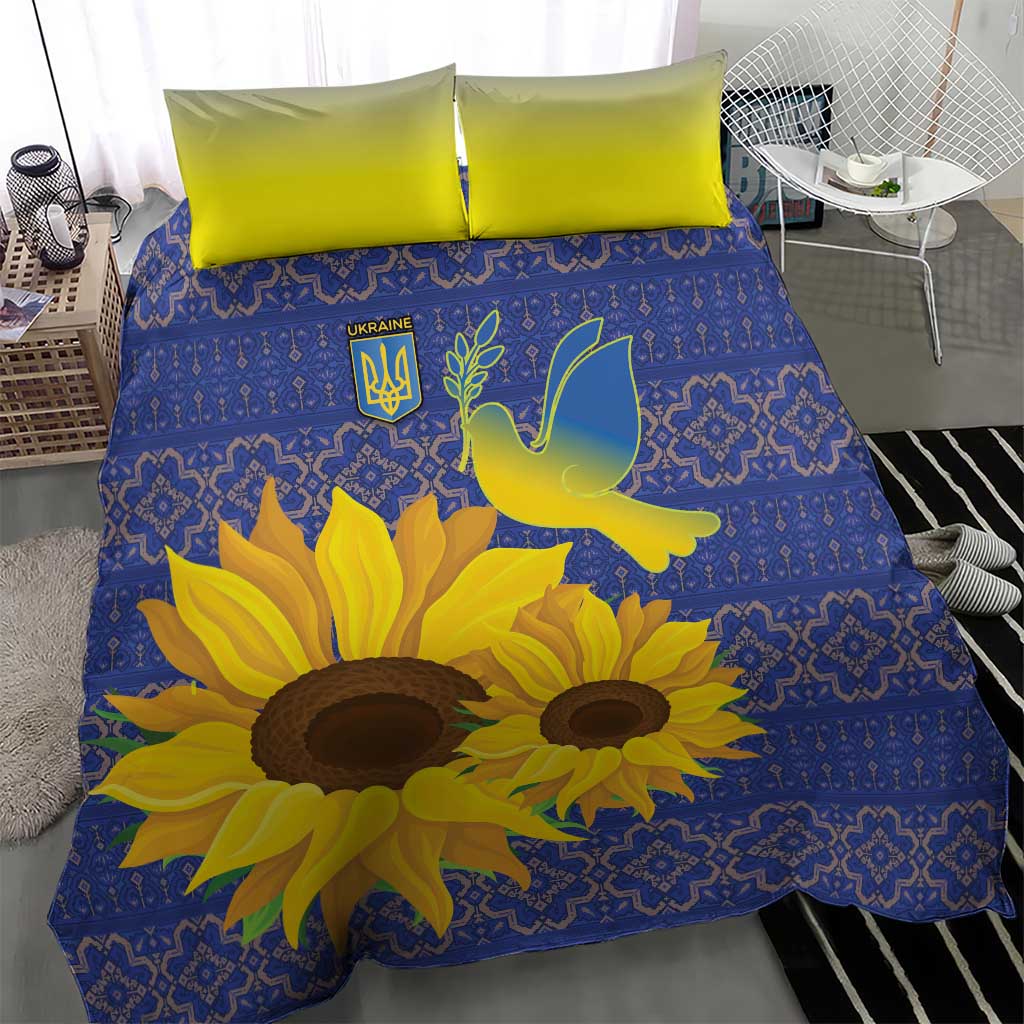 Sunflower duvet bedding set in blue with lime pillowcases and dove emblem