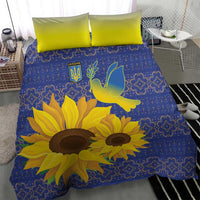 Sunflower duvet bedding set in blue with lime pillowcases and dove emblem