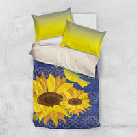 Bedding set with blue sunflower duvet, lime pillowcases, and white backing panel