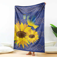 Blue sunflower blanket with peace dove and folk-style border pattern