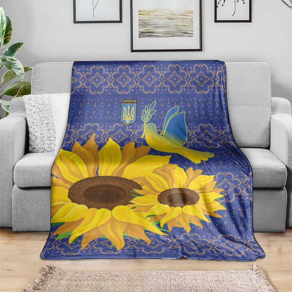Blue sunflower blanket with peace dove and decorative geometric folk pattern