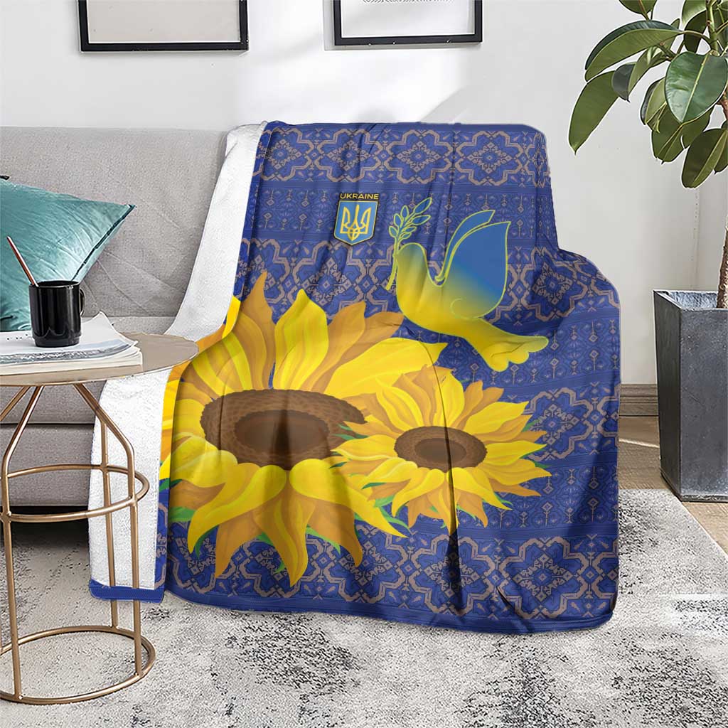 Blue sunflower peace dove blanket draped over chair