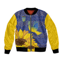 Blue and yellow bomber jacket with folk patterns, sunflower graphic, front zip