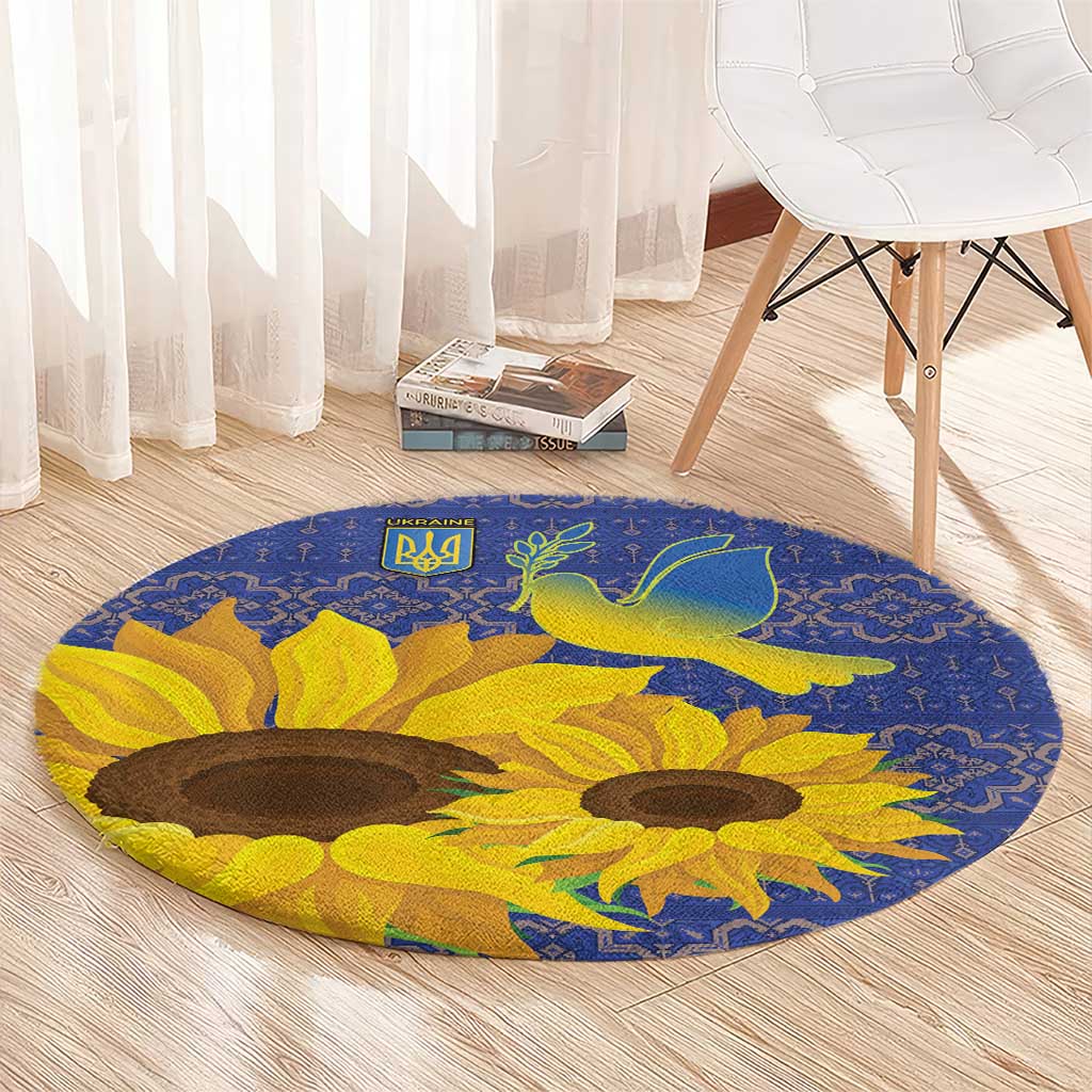 Blue round rug with sunflower pattern, green dove motif, and decorative border
