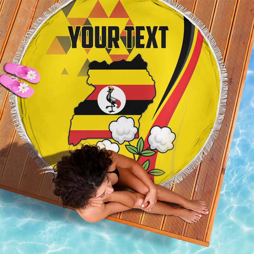 Yellow round beach blanket with fringed edge, Uganda map crowned crane and 'YOUR TEXT'.