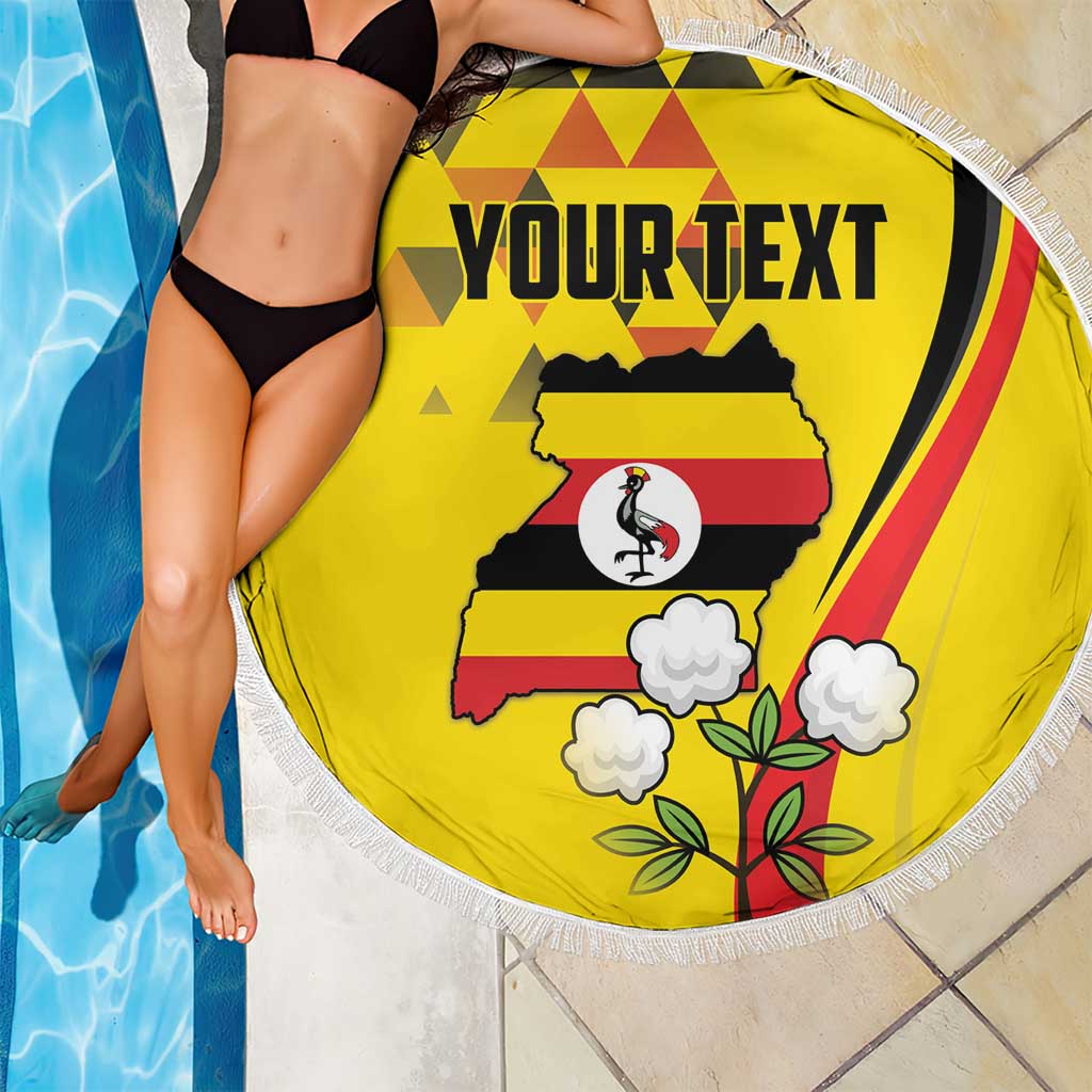 Yellow round beach blanket draped on person, white fringe, crowned crane Uganda and 'YOUR TEXT'.