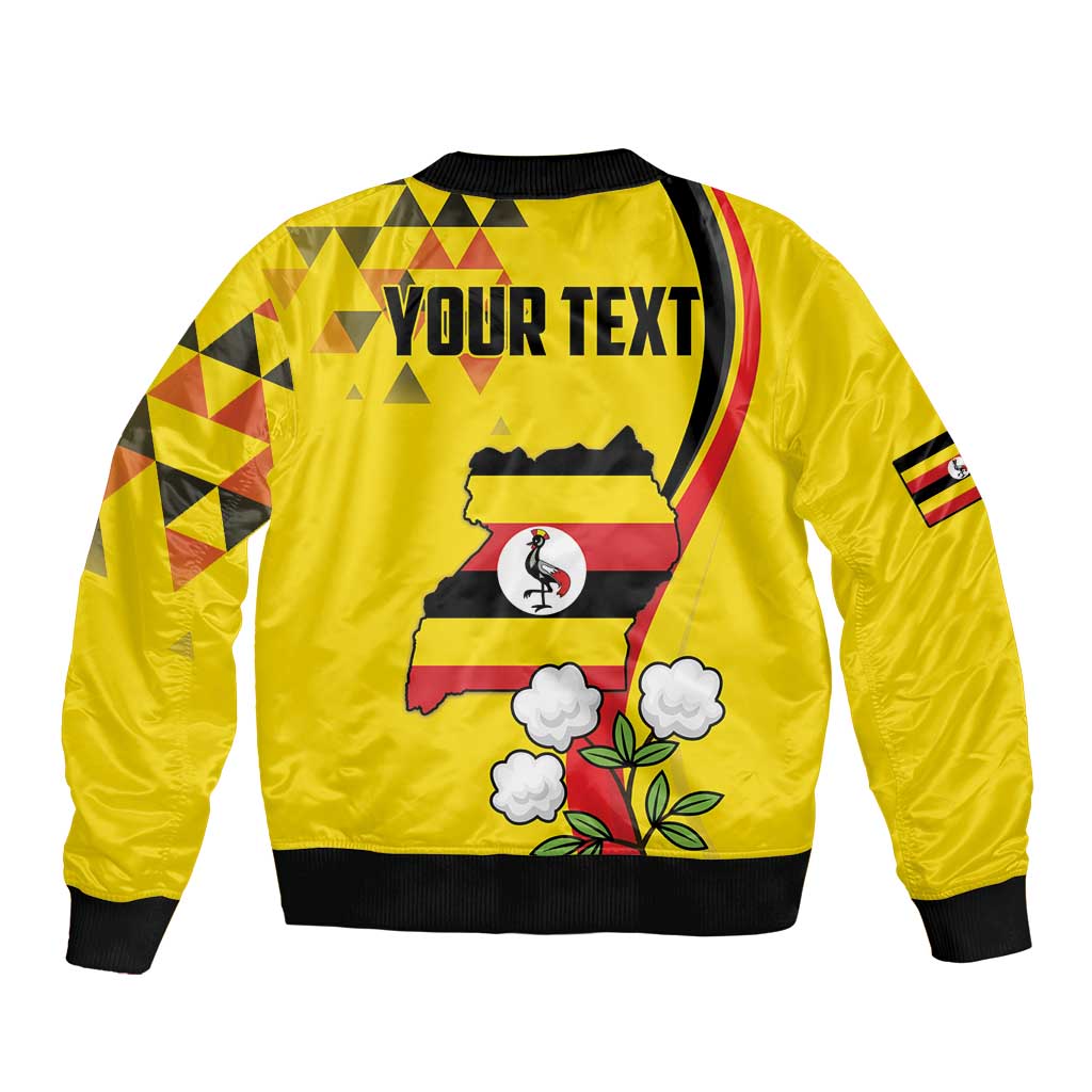 Yellow bomber jacket with black ribbed trim and YOUR TEXT crane graphic