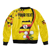 Yellow bomber jacket with black ribbed trim and YOUR TEXT crane graphic