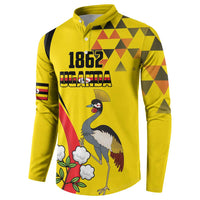 Yellow long-sleeve button sweatshirt with 1852 Uganda crane bird front, sleeve flag