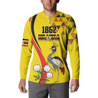Yellow long-sleeve button sweatshirt with 1852 Uganda crane bird front graphic on model