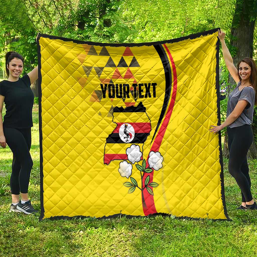 Yellow personalized quilt blanket with Uganda graphic, “YOURTEXT” text, and curved side stripe