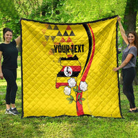 Yellow personalized quilt blanket with Uganda graphic, “YOURTEXT” text, and curved side stripe