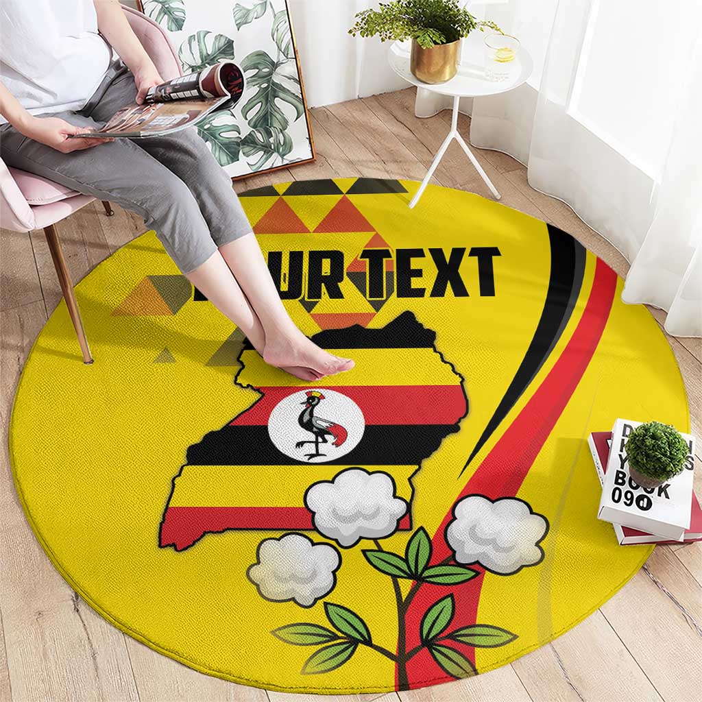 Yellow round area rug with 'YOUR TEXT' banner, crane bird, clouds, and tree leaves.