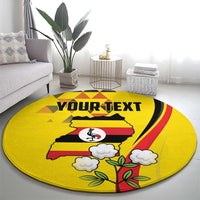 Yellow round area rug with 'YOUR TEXT' text, crane bird, and flowering branch with clouds.