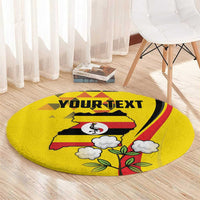 Yellow round area rug with 'YOUR TEXT' text, crane bird, clouds, and red stripe accents.