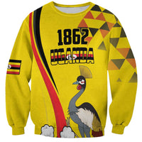 Yellow unisex sweatshirt with crowned crane bird front graphic and 1862 text